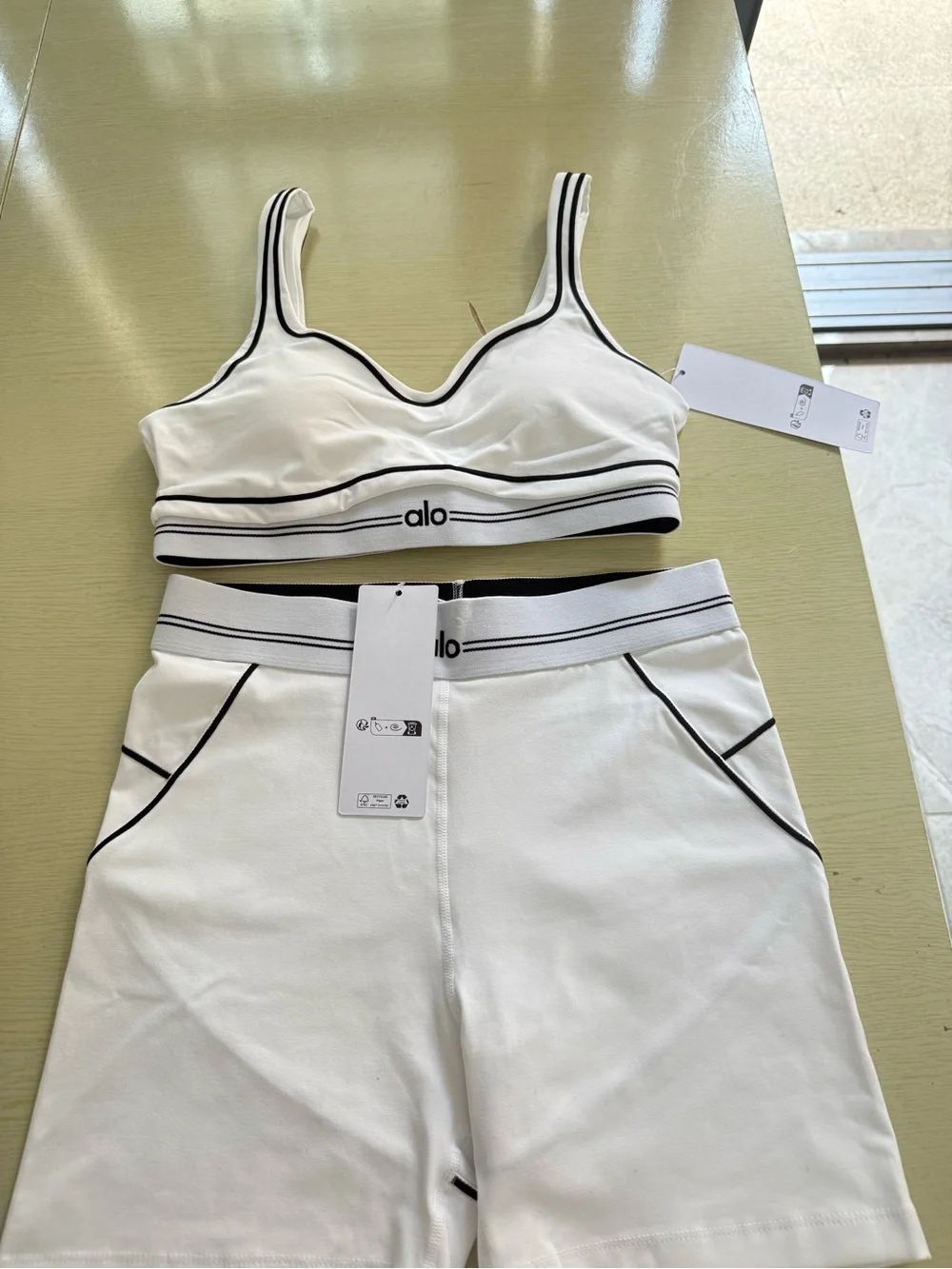 ALO Yoga White Sports Bra & Matching Shorts with Black Seam Detail